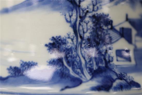 A Chinese blue and white beaker landscape vase, gu, Kangxi period, H. 30.5cm, lean to one side